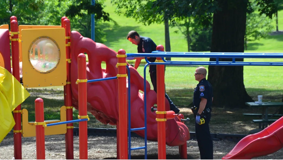 Playground with police officers present